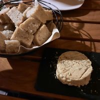 Homemade fermented cashew cheese and rice bread at Organi Chiado in Lisbon