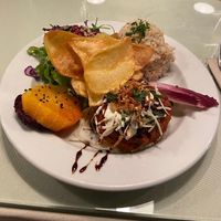 Legime burger with potatoes and greens at Organi Chiado in Lisbon