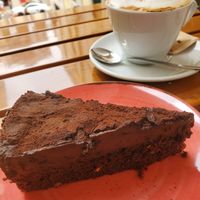 Chocolate cake and cappuccino at Organi Chiado in Lisbon