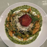 Penne with a cheesy sauce and a pesto  at Organi Chiado in Lisbon