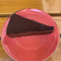 Chocolate cake - good, but could be paired with whipped cream or fresh berriess  at Organi Chiado in Lisbon