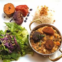 Sausages and beans with rice and vegetables at Organi Chiado in Lisbon
