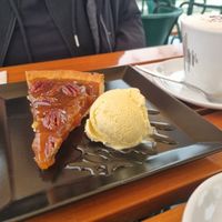 Salty caramel Pecanut cake with vanilla ice cream. at Organi Chiado in Lisbon