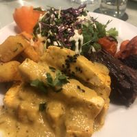 Grilled tofu with baked veggies and salad at Organi Chiado in Lisbon