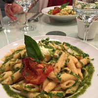 Creamy cashew tomato pasta with pesto at Organi Chiado in Lisbon