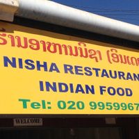Sign from street at Nisha Restaurant  in Phonsavan
