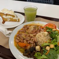 Traditional Portuguese dish, with rice and shiitake (vegan)
Melon and pineapple juice
Coconut vegan cake at Saladas+ in Aveiro