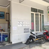 Front of shop, on the corner at An Lac in Kon Tum