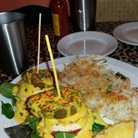 Fried avocado benedict & hash browns at No Bones Beach Club in Portland