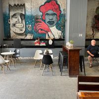 Fun mural artwork at Meraki Cafe in Volos