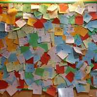 Wall of messages at Falafel Zudi in Warsaw