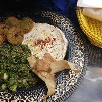 I believe this is menu 3. With Tabouleh, hummus, falafel, and i forgot the name of the other thing. Comes with 2 large pitas to deep. at Falafel Koy in Istanbul