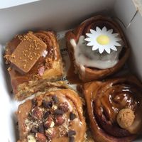 Cinnamon rolls with different toppings at Peas in Hasselt