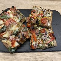 Aubergine pizza and mixed veg pizza at Romana Pizza in Lisbon