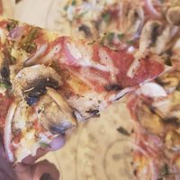 Vegan pizza. Go easy on the daiya cheese. It isn't the best vegan cheese but it will do in a pinch! at Pieology in Menifee