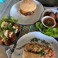 Gnome Nugs (vegan nuggets), Demon Drummies (crumbed cauliflower), The Phoenix (southern fried vegan chicken), and Garlic Bread Meatball Sub at Netherworld in Fortitude Valley