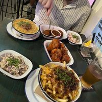Poutine, coleslaw, mac n cheese, vegan nuggets, and cauliflower wings  at Netherworld in Fortitude Valley