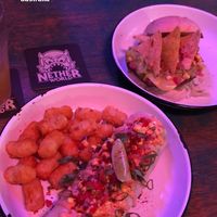 Breakfast burrito and nacho burger  at Netherworld in Fortitude Valley