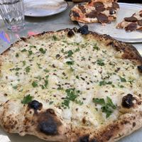 White Pizza (front) and Pepperoni (back)  at Floralia in Honolulu