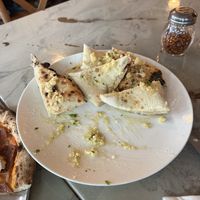 Half eaten order of garlic bread.  at Floralia in Honolulu