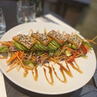 Green Dragon Salad
of glazed smoked tofu, avocado, sweet potato, red cabbage, pak choi, daikon, heritage carrot, peppers, with a Sake teriyaki & sesame dressing  at The Gate - Marylebone in London