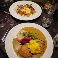 Katsu curry in front, gnocchi in back. at The Gate - Marylebone in London