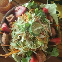 Vegan salad with tofu (huge bowl with rice noodles on bottom) at Galanga in Bunutan