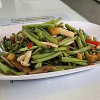 Quick-fried water spinach seasoned with chilli and soy sauce, 45 baht  at Su Ting Sian -Soi Anamai 23 in Khon Kaen