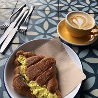 Egg mayo croissant and cappuccino  at The Fields Beneath - Kentish Town in North West London