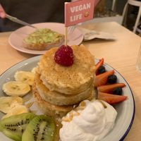 Pancakes with vegan cream and fruit  at Chillin' Cafe in Madrid