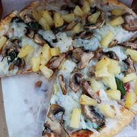 Vegan cheese, mushrooms, spinach and pineapple. at Poppa Rollo's Pizza in Waco