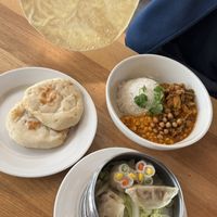 Naan, gyozas, papadum, curry  at Lily's Maxim in Basel