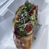 Blistered tomato tartine with cashew cheese and pesto - vegan  at The Heart Cafe in Bragg Creek