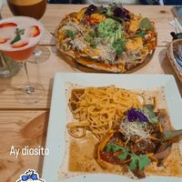Pizza y fideos en huancaina at Vida Vegan Bistro in Cusco