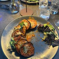 Aubergine parmigiana, with fries. Very tasty! at Naar RestoBar in St Julians