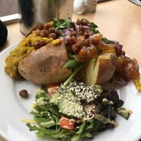 Dahl and mango chutney baked potato  at Larder in Brighton