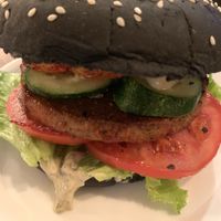 seitan burger layered with french fries  at Ugol in Moscow