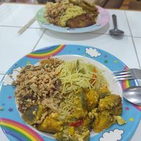 Two full plates of food for 100 bhat at Ranahat Je Vegan Restaurant in Ayutthaya