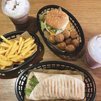 CBC Burger and Chicken Sriracha Wrap with Popcorn Chicken, Air Fries and Chocolate/Strawberry Milkshakes at Earth Restaurant & Takeaway in Petersfield