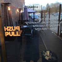 Outdoor seating area at Earth Restaurant & Takeaway in Petersfield