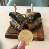 Black burger with Zucchini Chips at Plant Cafe in Hamala