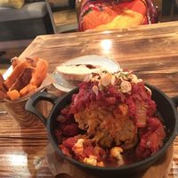 Whole roasted Cauliflower main with sweet potato fries!  at Source in York