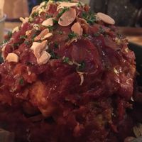 Whole roasted cauliflower with tomato sauce  at Source in York