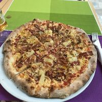 Capricioze pizza with vegan bacon. Delicious at Sa Cova in Mallorca