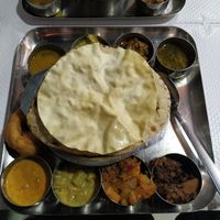 11,50€ (just ask them to make it vegan) at Saravanaa Bhavan in Paris