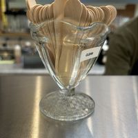 The use wood for samples. 🥹  at Angela's Ice Cream - Petaluma Blvd in Petaluma