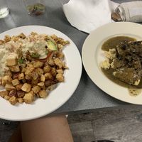 Vegan benedict with a side of vegan biscuit and gravy at Lazy Day Cafe in Salt Lake City