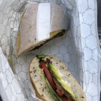 AVOCADO TEMPEH MELT. Order. Multiple times. It's the best sandwich I have ever had. Scrumptious vegan carrot/potato cheese sauce. Keeps for 24hrs! at Living on the Veg in Beach Haven