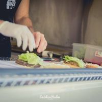 Hands at The Veggie Burger Club Food Truck in Buenos Aires