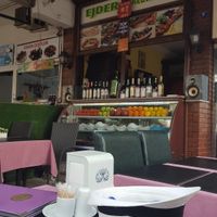 Table outside with view of restaurant at Edjer Restaurant in Selcuk